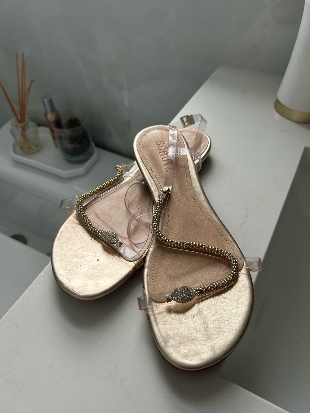 SCHUTZ Gold Jeweled Slide Sandals with Clear Straps